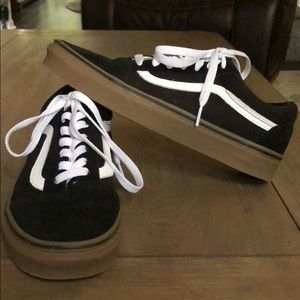 Black and white old school vans with a brown sole